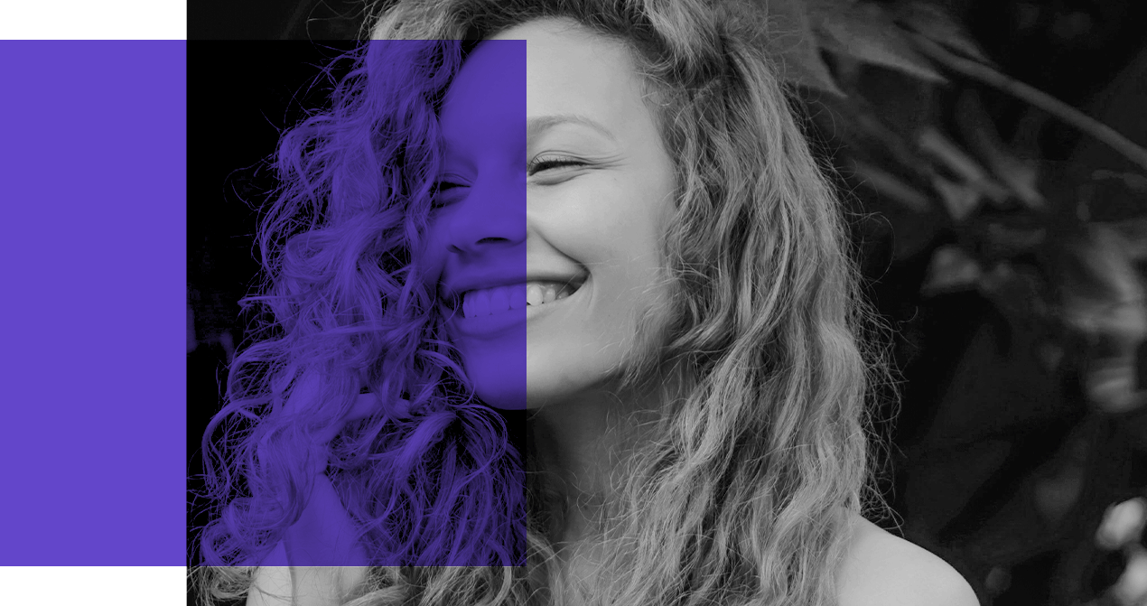 Woman with hand in hair